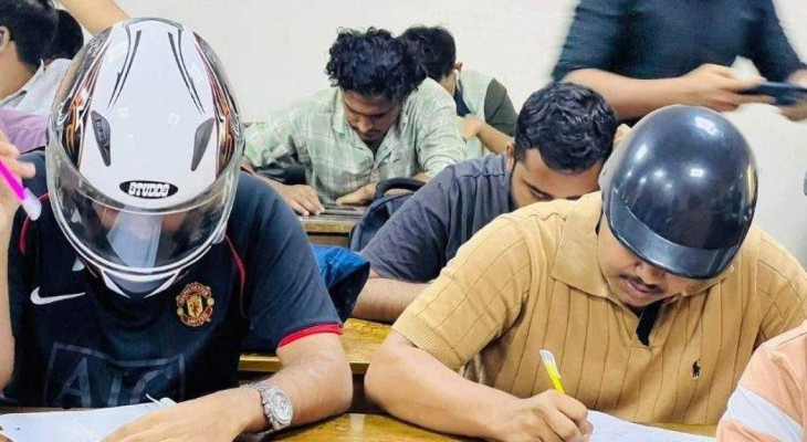 নিরাপত্তাহীনতায় হেলমেট পরে পরীক্ষা